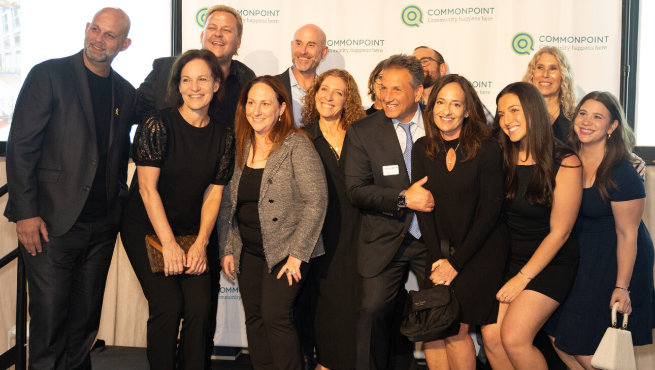 A group of people posing for a photo at the Commonpoint Gala.